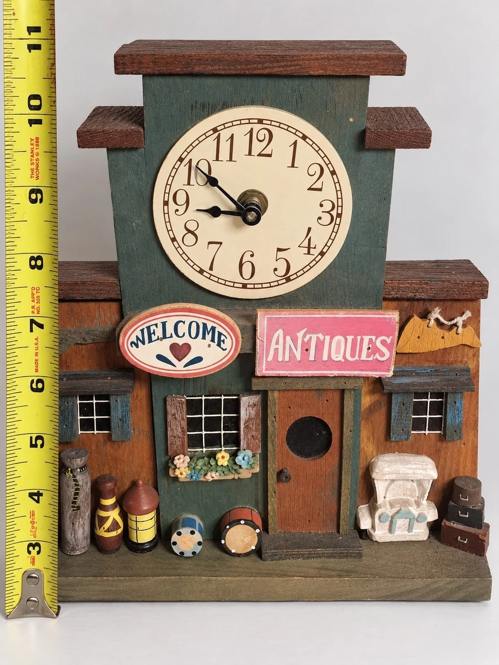 Rustic Green Wooden Wall Clock Decor with Pink Antiques Sign